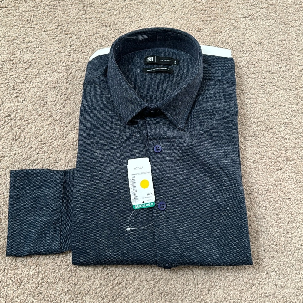 Simon’s button shirt